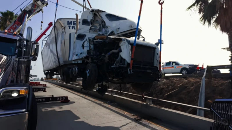 Tow truck recovering a stalled vehicle on I-26 South between the Long Shoals Road exit and.