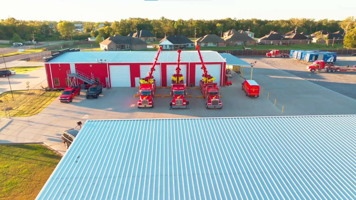 Towing Asheville fleet of tow trucks and flatbeds parked at the Asheville NC dispatch yard